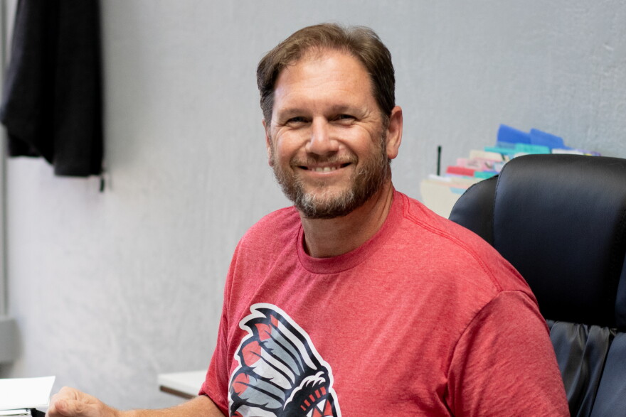 Superintendent and principal Jason Midkiff sits at his desk at Whitebead Public Schools. Midkiff met with the school board on Monday to find a solution to keep serving students meals at the end of the school day.
