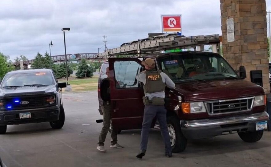 Men who appear to be Immigration and Customs Enforcement agents are parked outside Circle K gas station on Paul Bunyan Drive on Friday, June 12, 2026.
