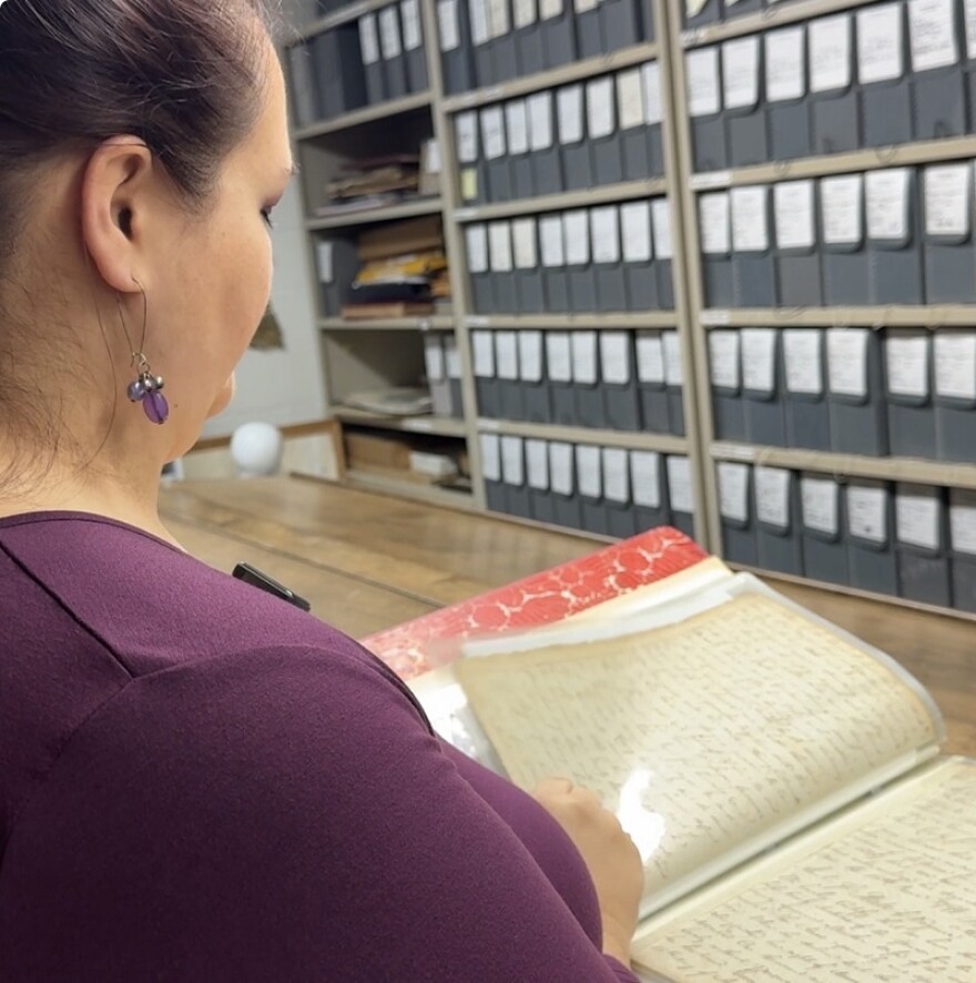 Olivia Herrell welcomes visitors to the Henry County Historical Society