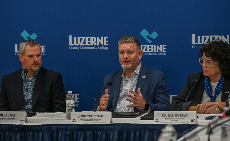 Bill Burke, left, vice president of Enrollment & Student Success at Johnson College, John Yudichak, Luzerne County Community College President, and Jill Murray, Lackawanna College president, discuss how higher education is providing training to skilled workers.
