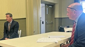 Waverly Twp. resident Terrence Neville, left, testifies during an appeal to a zoning permit in the township. Attorney Matt Barrett, representing Rabbi Benny Rapoport, who plans to build Chabad of Abingtons, looks on.