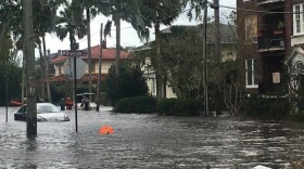  Rescuers help a resident escape their home after Hurricane Irma in September 2017.