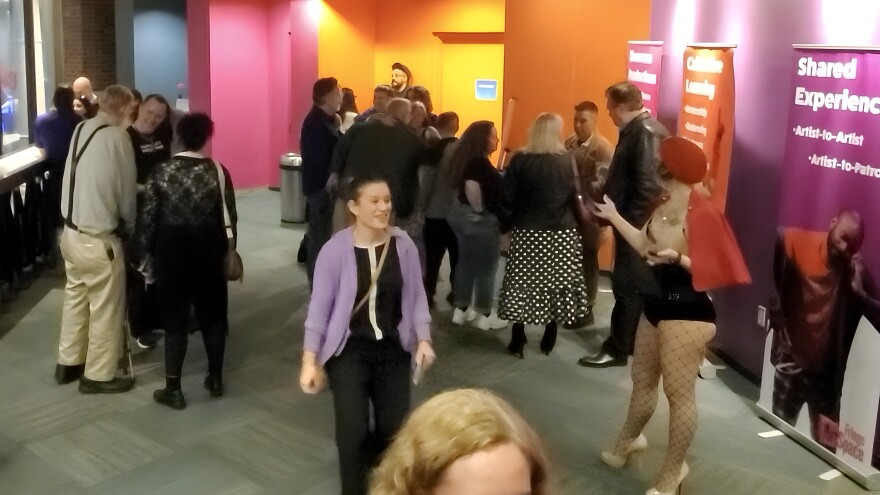 Patrons and performers mingle during the Orlando Fringe ArtSpace's grand opening bash Wednesday in downtown Orlando.