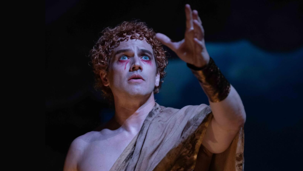 Nero looks off into the dark distance with blood dripping from his eyes.