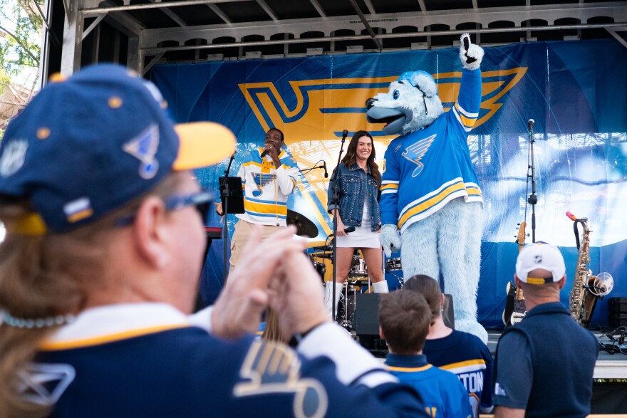 St. Louis Blues’ hockey fans celebrated the start to a new season as the team's mascot walks on stage at Union Station ahead of the first season game against the Minnesota Wild on Thursday, Oct. 9, 2025.