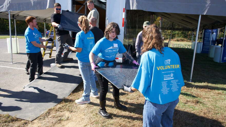 Volunteers unload the trailer that brought the Wall That Heals to USI, Oct. 28, 2026