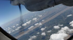 A Vietnamese Air Force plane returns from a search operation over Vietnam's southern sea.