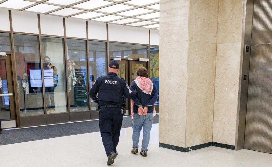 Michigan State University police arrested 19 pro-Palestine protesters for trespassing after the protesters occupied the first floor of the Hannah Administration Building for more than two hours on April 10, 2025. The group wants MSU to divest from financial holdings in Israel.