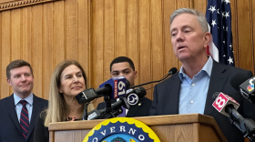 Gov. Ned Lamont talks up coming tax cuts but preaches overall restraint. At left, Comptroller Sean Scanlon, Lt. Gov. Susan Bysiewicz and Treasurer Erick Russell.
