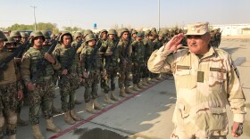 New recruits of the Afghan 215th Corps assemble at Camp Shorabak in Helmand Province.