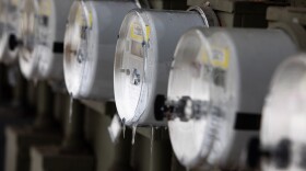 Icicles hang from electricity readers.
