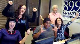 Saturday's volunteers celebrating a successful shift in the phone bank room.