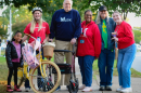 Mary Munford Elementary principal (center) Greg Muzik, flanked by students, parents and staff, at Walk, Bike, Roll to School Day