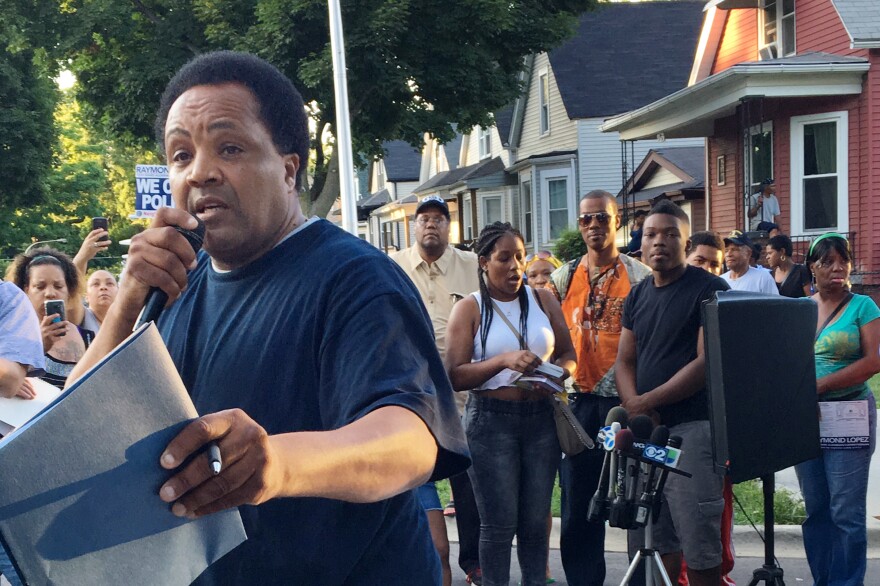 Community activist Andrew Holmes reads off the locations where youngsters have been injured unintentionally by gunfire on Chicago streets.