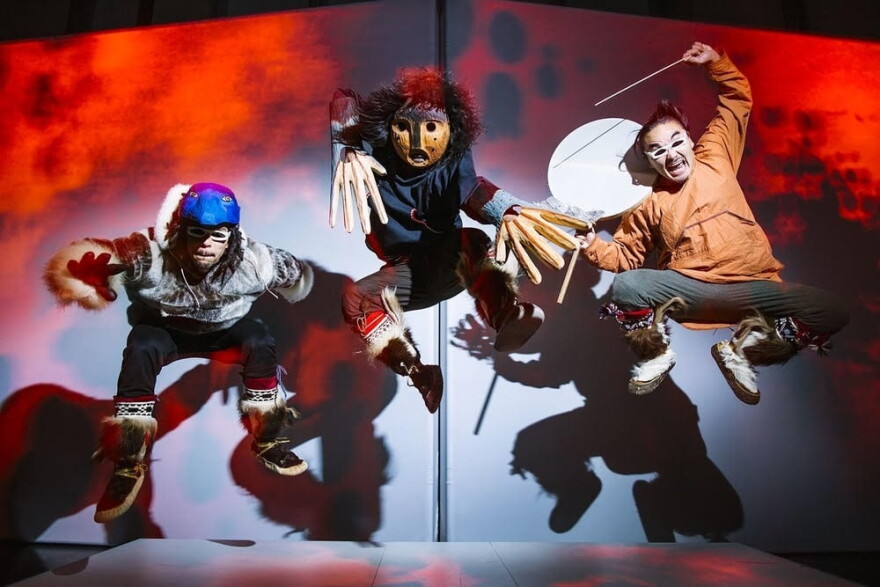 Phillip Blanchett, Stephen Blanchett and Ossie Kairaiuak dance in a performance by Pamyua.