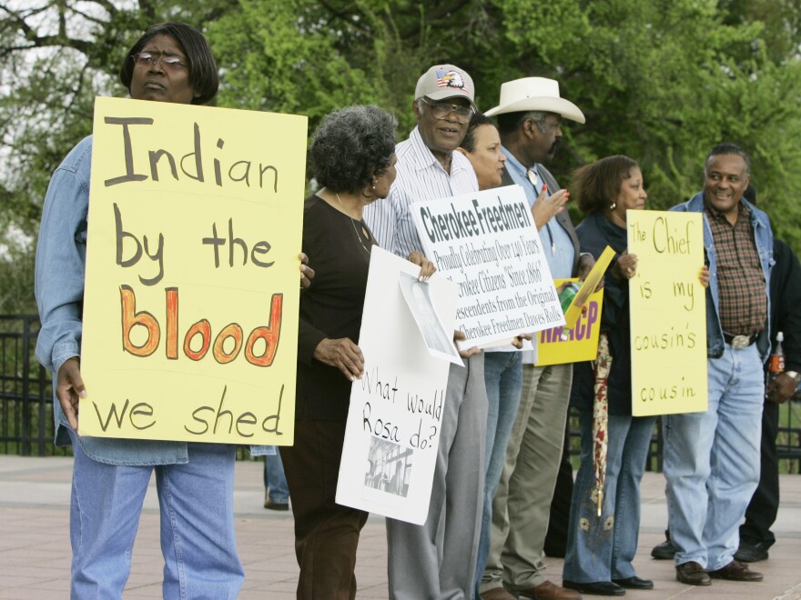 Waynetta Lawrie (left), of Tulsa, Okla., stands with others at the state Capitol in Oklahoma City in 2007, during a demonstration by several Cherokee Freedmen and their supporters.