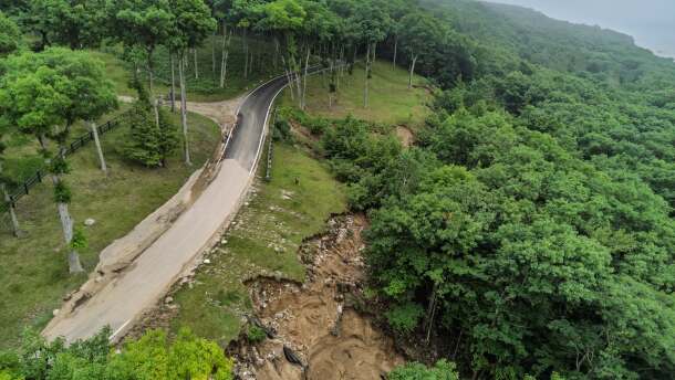 Water damage from flash flooding Monday, June 29, on M-119 near Lamkin Road.