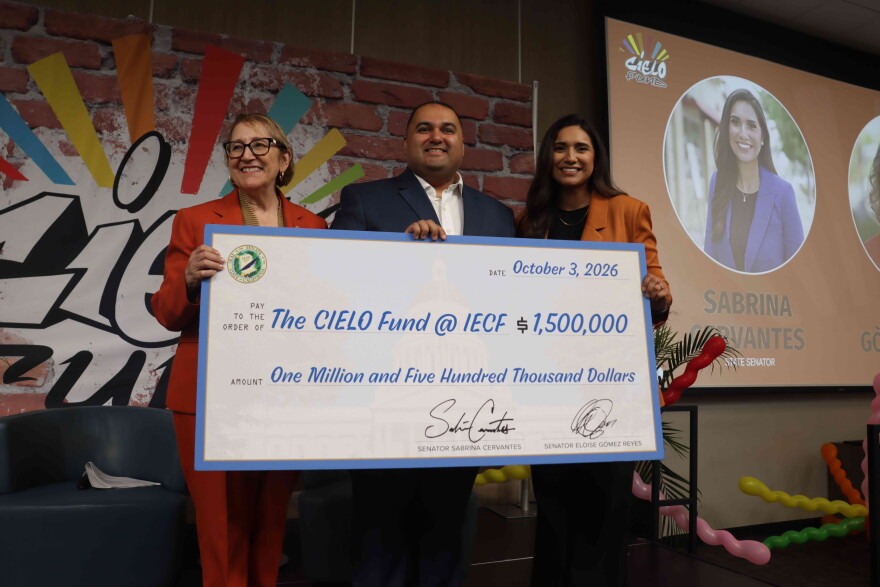 State Senators Sabrina Cervantes and Eloise Gómez Reyes present CIELO Fund founder Jesse Melgar with a $1.5 million check to support new initiatives focused on research, civic engagement and media coverage of the Inland Empire’s Latino communities during the CIELO Grants and Scholarships Brunch in Riverside on Saturday, October 3, 2026. .
