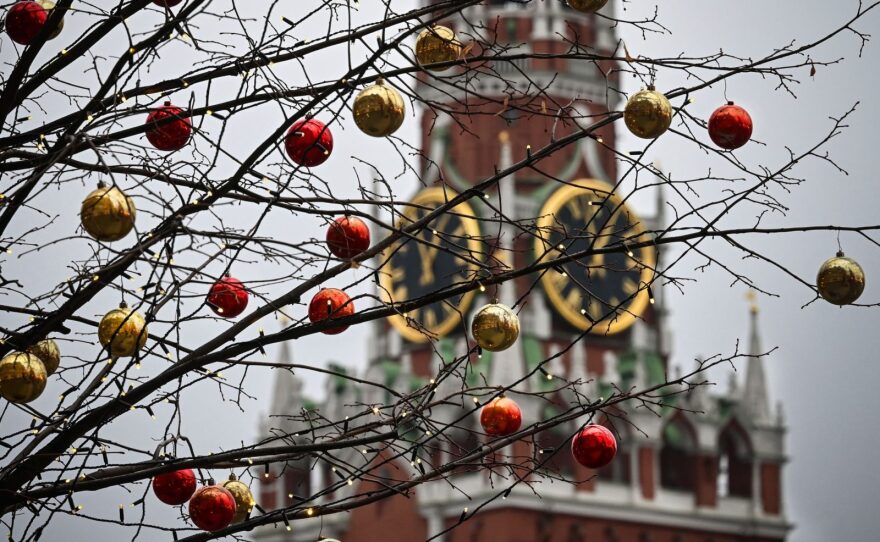 Christmas decorations hang in front of the Spasskaya Tower of the Kremlin in the Red Square downtown Moscow. Russian intelligence agencies are behind a newly-discovered extensive hack of at least five U.S. government agencies. 
