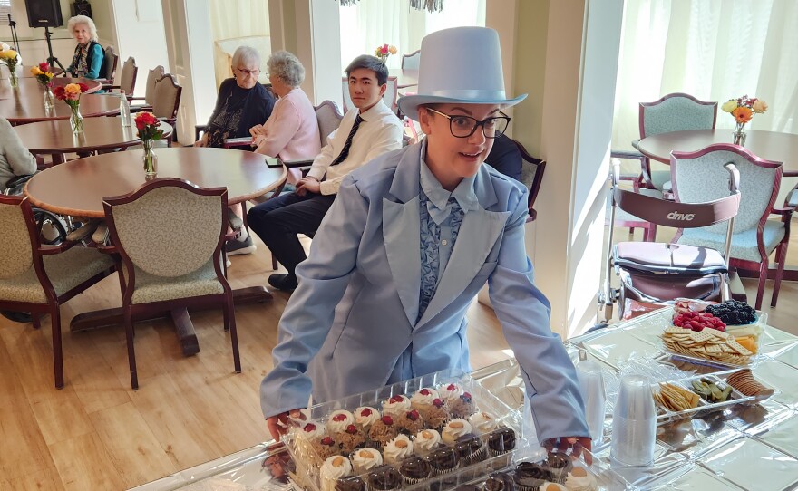 Amber Lorimore, Activities Director, shows off the cupcakes for the Senior Prom