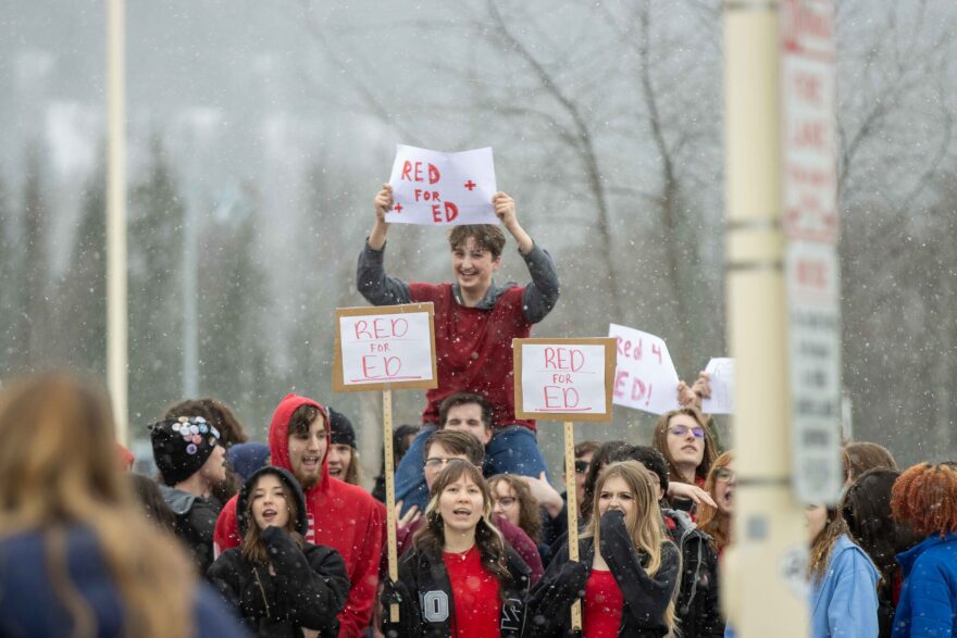 Eagle River High School students protest Gov. Mike Dunleavy’s education funding veto on Thursday, April 4, 2024. A new study shows most Alaska students are not proficient in core subjects.