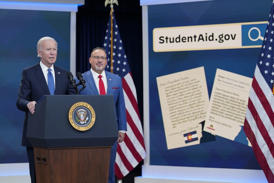 President Joe Biden and Education Secretary Miguel Cardona announce the student debt relief application is now live.