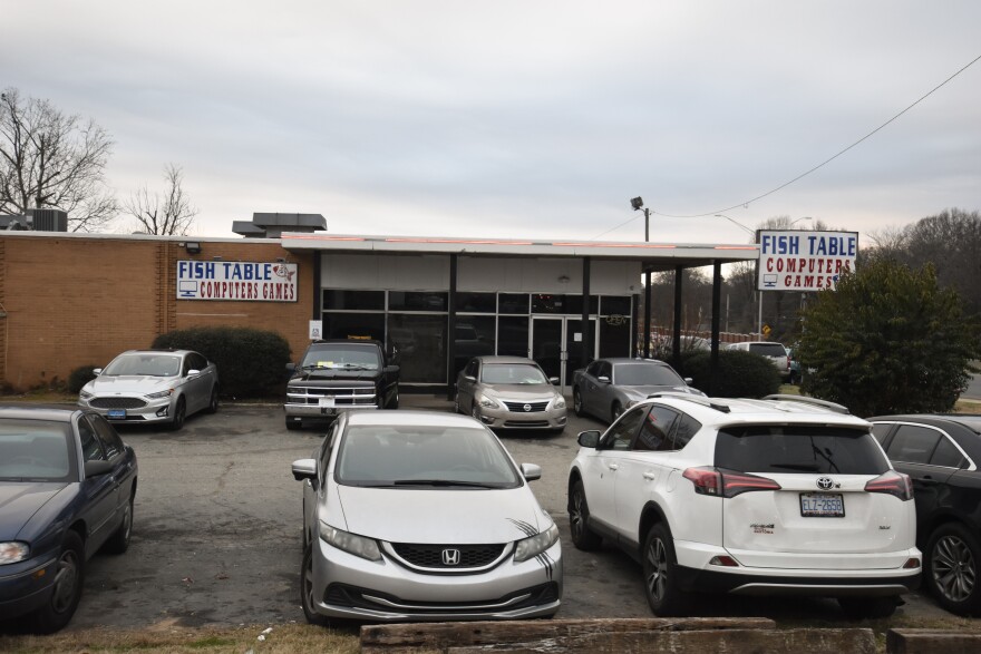 The parking lot was full outside of a fish table arcade off Independence Boulevard in Charlotte on Wednesday, Jan. 11, 2023.