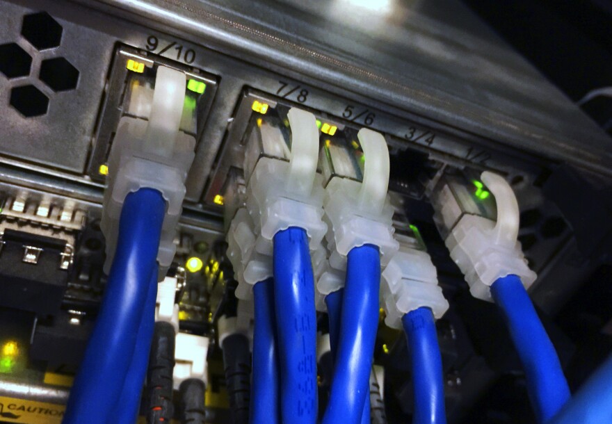 In this file photo, cables are connected to a server capable of handling an email server.