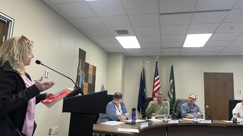 Antrim County resident addresses the county commission, including Victoria Bishop (second from left). (Photo: Claire Keenan-Kurgan/IPR)