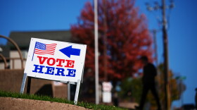 A sign invites voters to cast their ballots on Wisconsin's first day of early voting, Tuesday, Oct. 20, 2026, in Eau Claire, Wis.