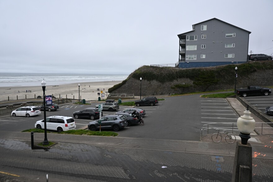 A parking lot next to the beach