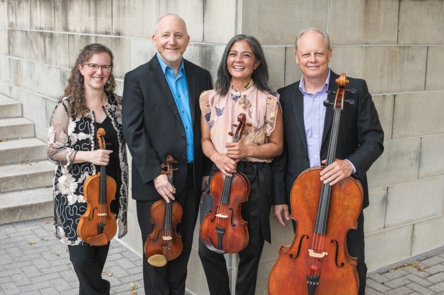 Performers in the Ariana String Quartet. From left to right, violinist Corinne Stillwell, violinist John McGrosso, violist Joanna Mendoa, and cellist Kurt Baldwin.