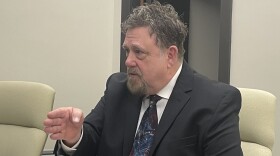 Whitehall City Councilmember Gerald Dixon speaks to reporters before he is sworn into a new term on city council on December 9, 2025. Dixon was released from jail earlier in the day after being charged with sexually abusing a minor.