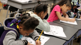 First grade students fill out worksheets at Ingels Elementary School, which recently switched to a year-long model.