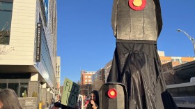 A protester dressed as a Flock Camera at Wednesday's rally.