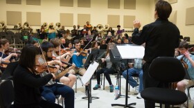 photo of an orchestra rehearsal