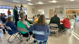 Greenway area residents listen to an announcement from Blandin Foundation Grants Director Kyle Erickson on Oct. 21, 2026 at the Marble City Hall.