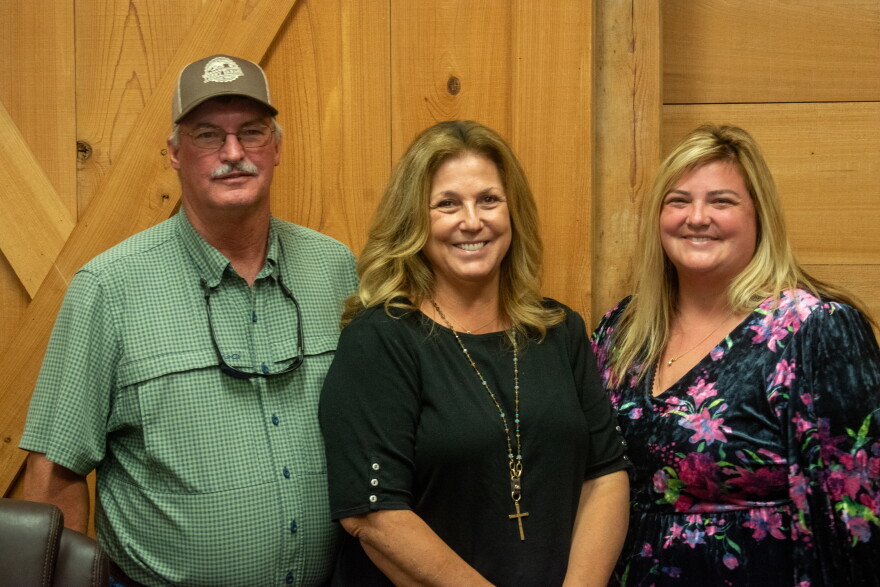 From left, Carl Perry, Ronda Perry and Amy Ridgedale pose at their sugar cane farm Glades County on Tuesday, Sept. 8, 2026.