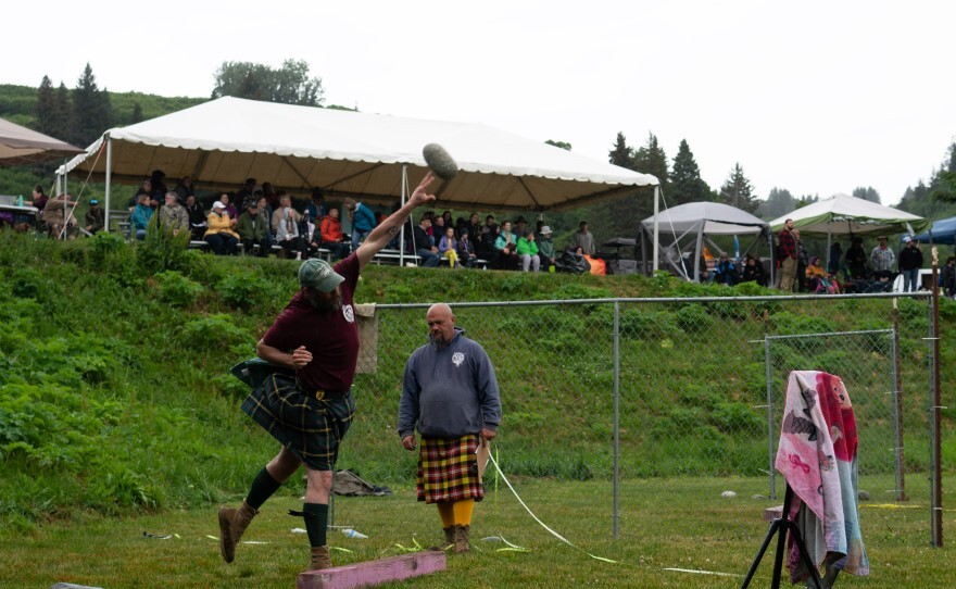 Jason Simmons throws a stone during the Katchemak Bay Highland Games.