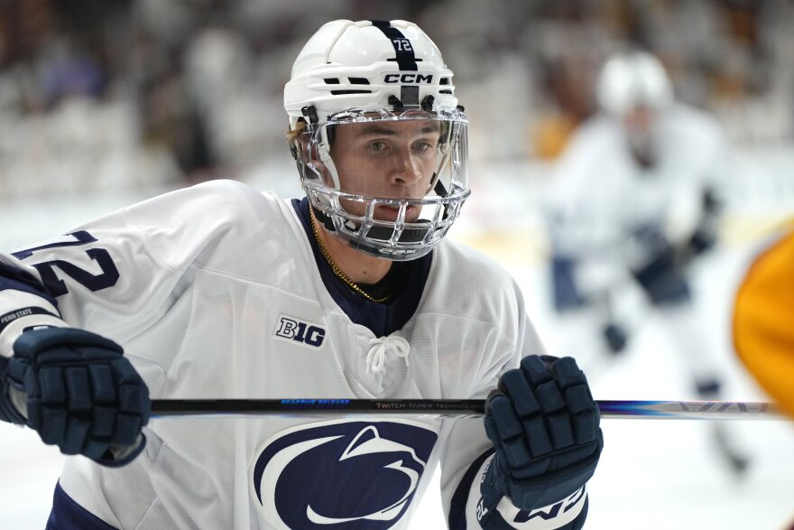 Penn State's Gavin McKenna looks for the puck during the first period of an NCAA college hockey game against Arizona State, Friday, Oct. 3, 2025, in Tempe, Ariz. 