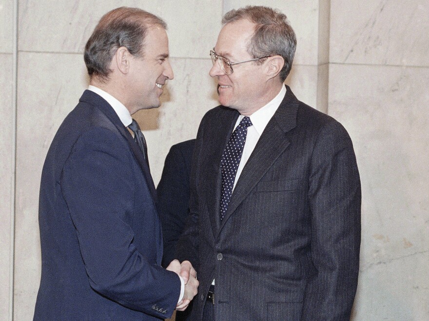 Supreme Court nominee Anthony Kennedy, right, shakes hands with Senate Judiciary Committee Chair Biden before the start of his confirmation hearing on Dec. 15, 1987. Kennedy, President Reagan's third nominee for the position, won bipartisan praise from senators.
