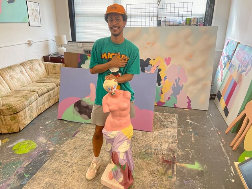 Artist Bradd Young, who goes by "Salut," in his Hungerford studio.