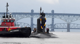The Virginia-class submarine USS Minnesota (SSN 783) heads up the Thames River toward Naval Submarine Base New London in Groton.
