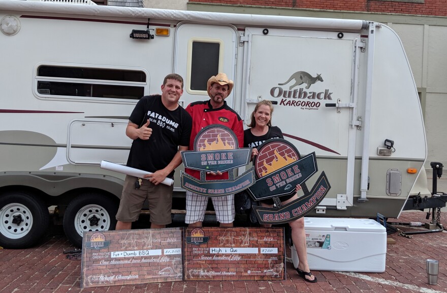 Mike Peterson, left, celebrates a win at the Smoke on the Bricks competition in Baldwin City, Kansas, in June 2019.