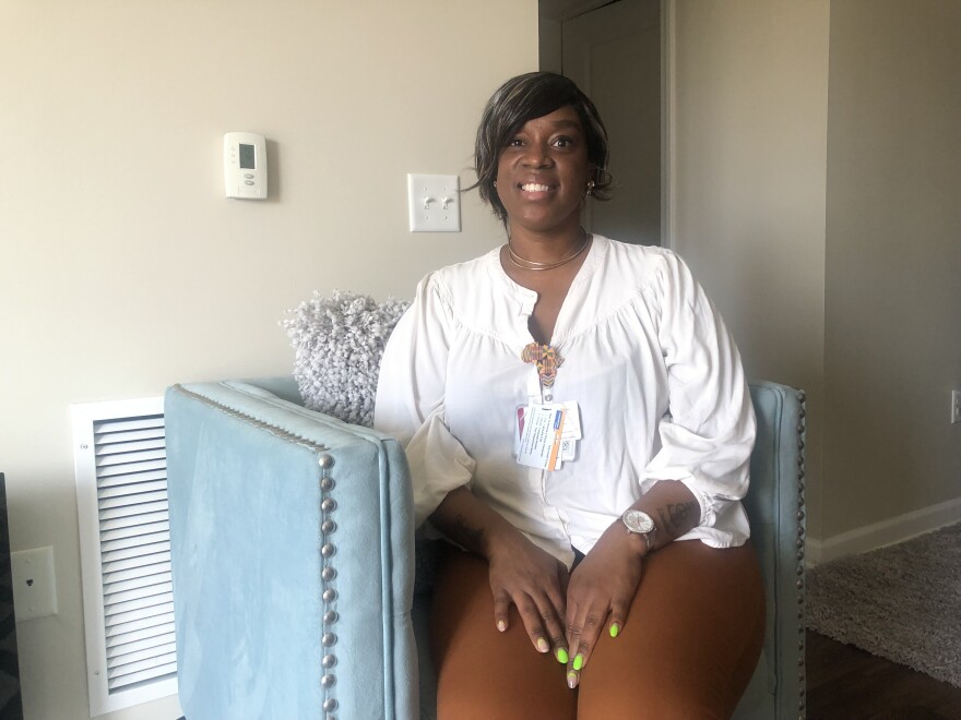 Nashuan Young in her apartment at Marshall Common's -- one of ten affordable housing complexes run by New Neighborhoods in Fairfield County.