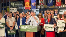 Senator speaks at podium