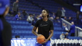 Kentucky's Antonio Reeves (12) warms up before an NCAA college basketball game against Florida A&M in Lexington, Ky., Wednesday, Dec. 21, 2022. (AP Photo/James Crisp)