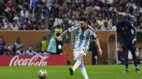 FILE - Argentina's Lionel Messi scores the opening goal from the penalty spot during the World Cup final soccer match between Argentina and France at the Lusail Stadium in Lusail, Qatar, on Dec. 18, 2022. Sotheby's is to auction off six first half shirts worn by Lionel Messi during Argentina's winning run at the soccer World Cup in Qatar in 2022, including the one in the final, and thinks they could become the most valuable collection of sports memorabilia ever sold at potentially more than $10 million.