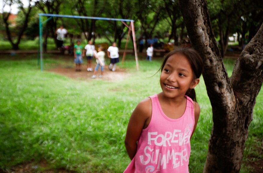 A girl in a park in Managua, Nicaragua. The country topped the list for gains in happiness.