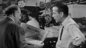 Actors Ed Begely and Humphrey Bogart in the 1952 film "Deadline USA."